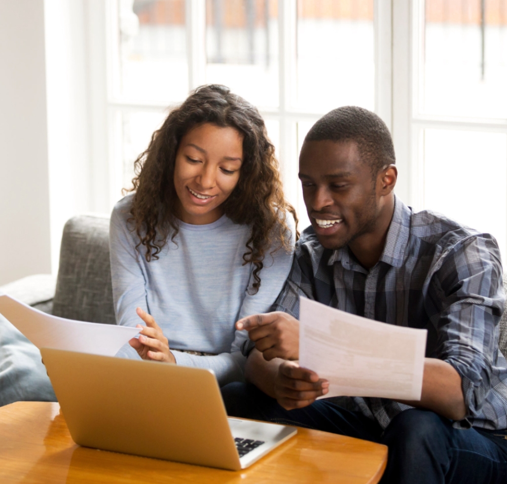 Residents reviewing energy billing services and monthly payments