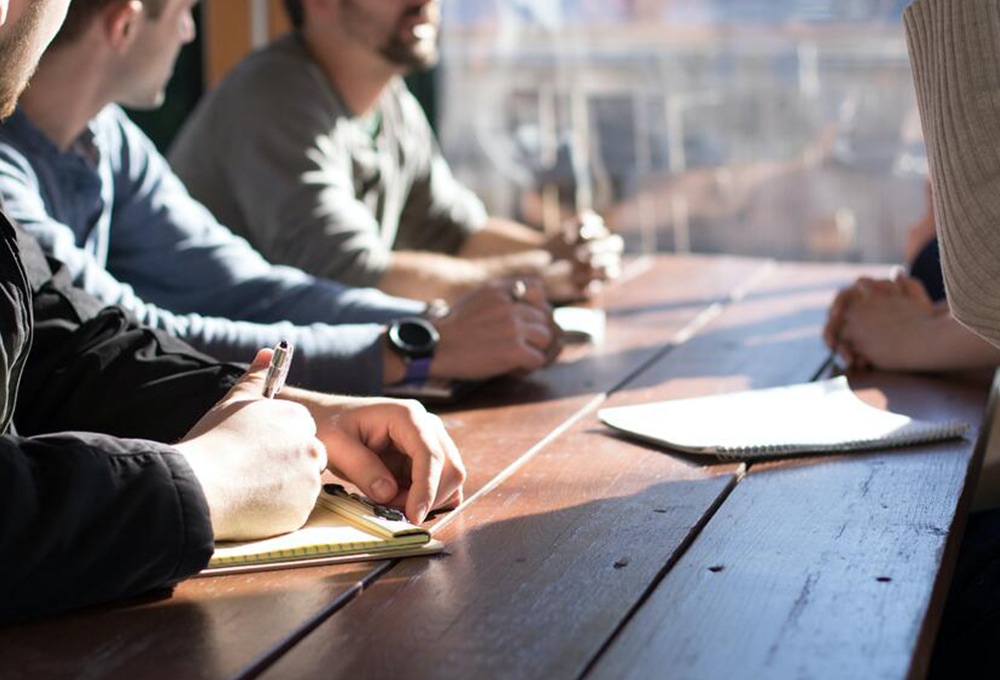 Business meeting around a table