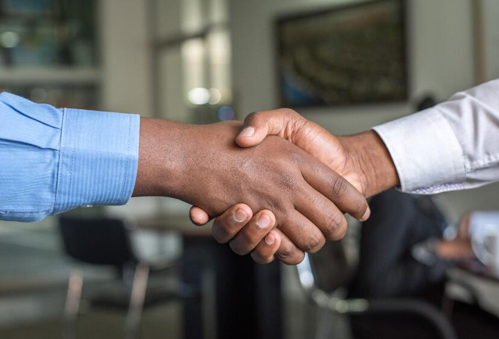 Two people shaking hands